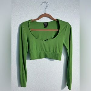 Tight Long sleeve cropped V-neck.